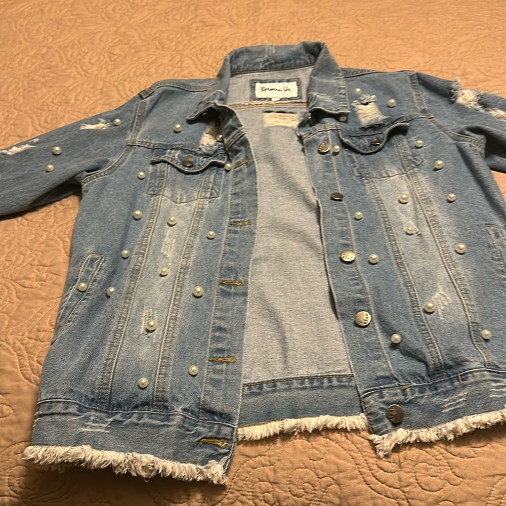 Detressed embezzled with pearls